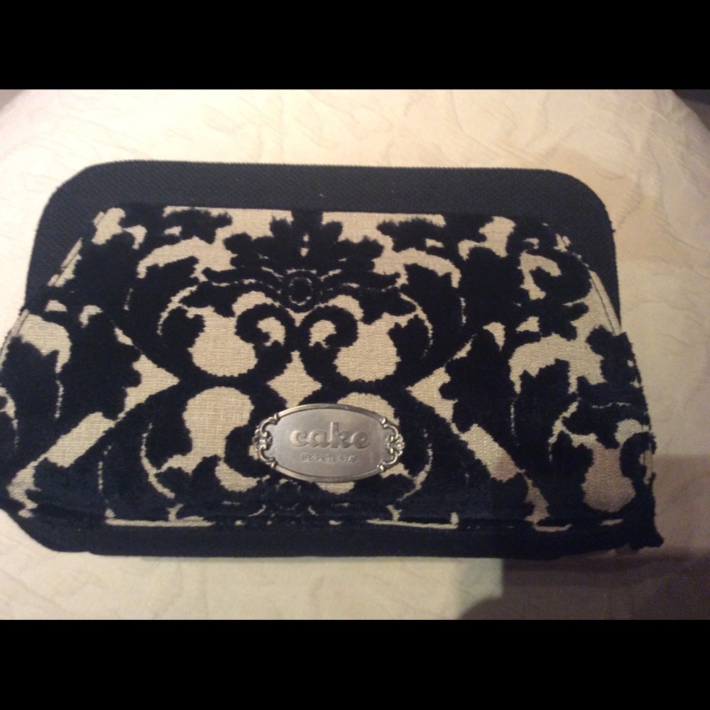 Elegant Clutch/Diaper bag. NEW.  NEVER USED
